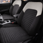 Huse auto dedicate Dacia Bigster piele ecologica si material textil, negru bej